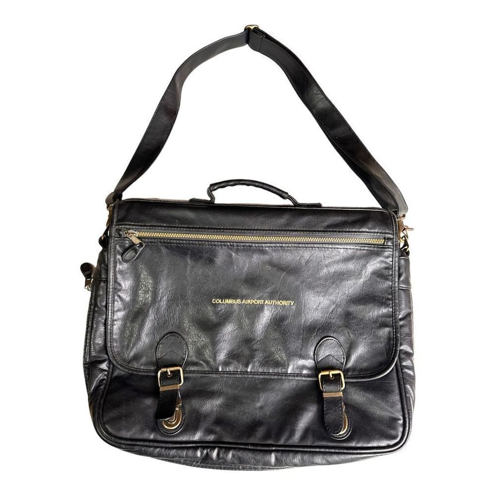 Large leather travel/work bag black with lots of pockets adjustable shoulder str